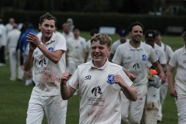 Scalby 2nds celebrate their cup final win. PHOTOS: ZACH FORSTER
