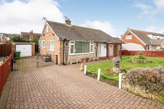 This three bedroom bungalow is for sale with Tipple Underwood with a guide price of £305,000.