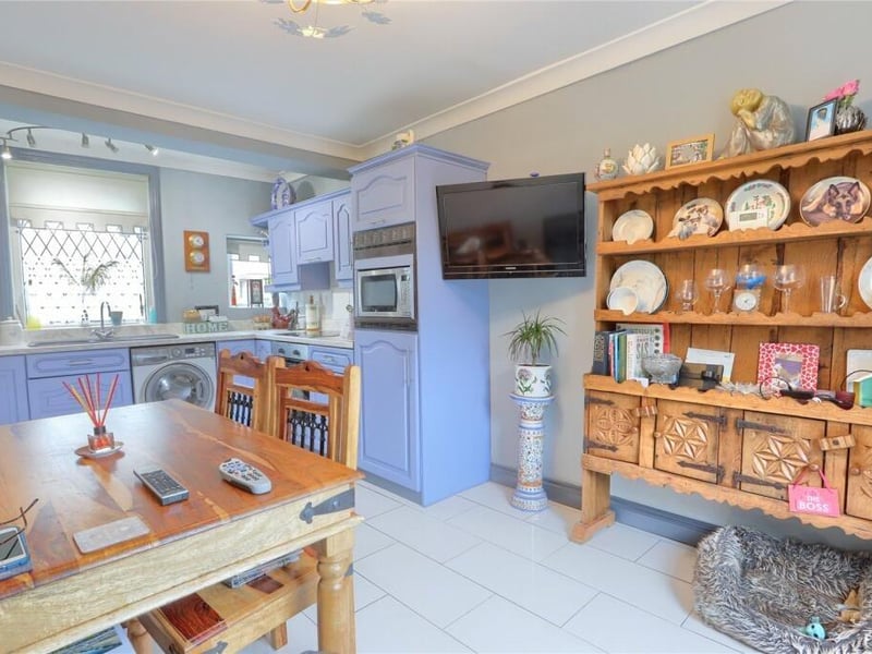 The bright and roomy kitchen with diner.