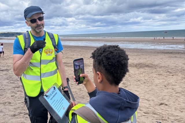 Community clean-up event at Whitby beach.