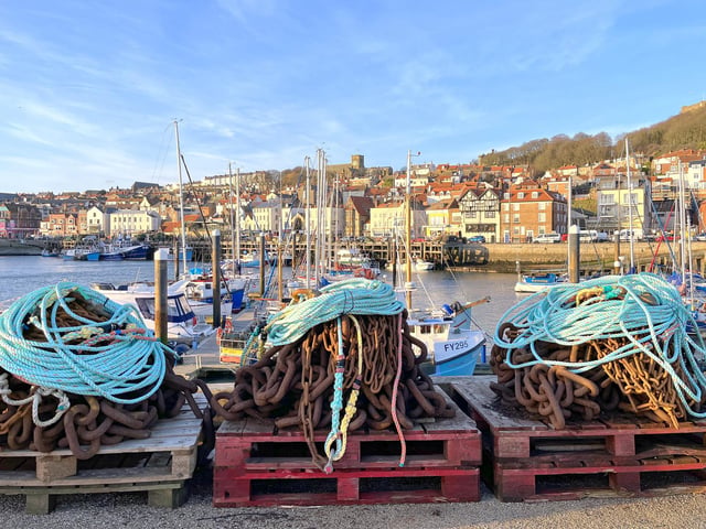Ropes and chains on the pier, by Tony Freeman.