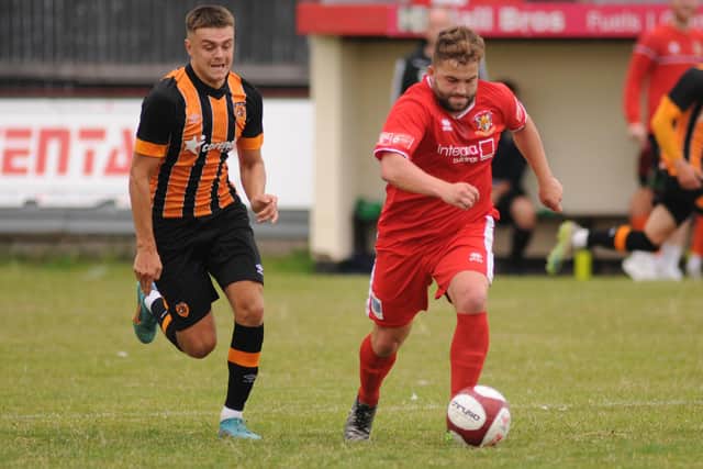 Andy Norfolk collected an early booked at Grimsby