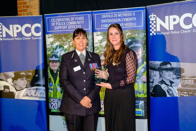 PCSO Kath O’Reilly receiving her award from Deputy Chief Constable Claire Parmenter, the national lead for PCSOs.