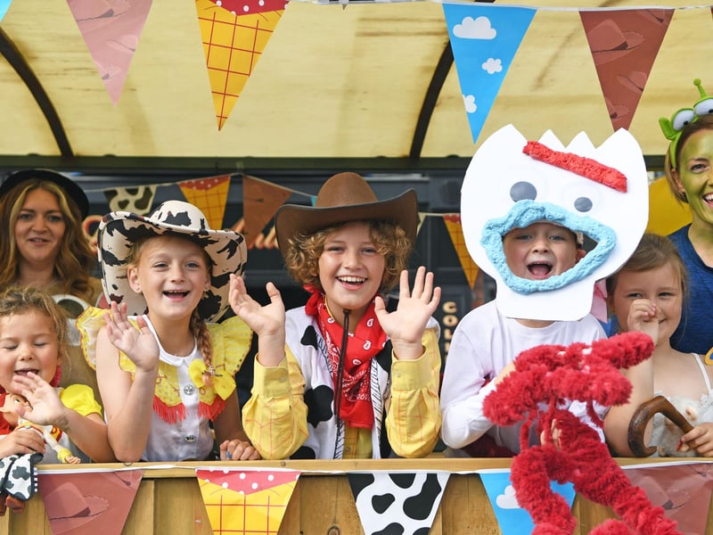 Toy Story characters in the fancy dress parade. photo: Gerard Binks