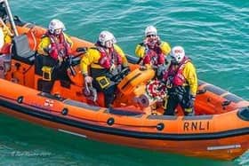 Flamborough RNLI crew place the memorial wreath at sea.picture: RNLI/Rod Newton