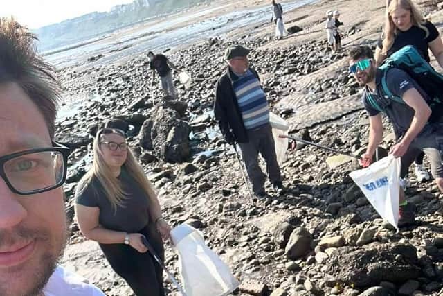 Beach Cleaners on North Bay participating in Sea Life Scarborough's Beach Clean