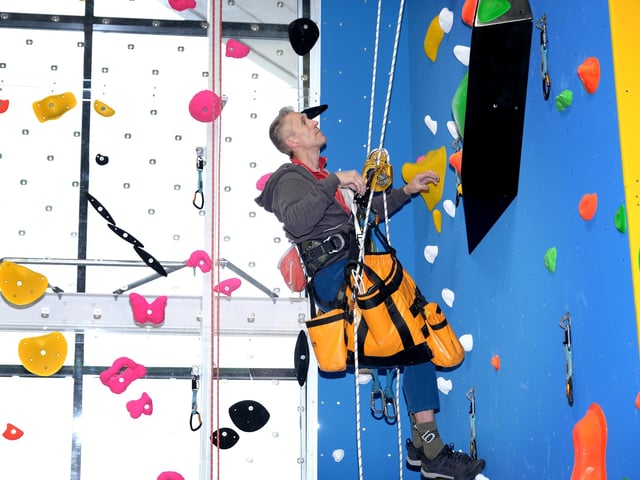 Steve McClure plots a route on the wall. picture: Richard Ponter