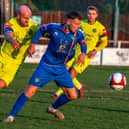 Priestley Griffiths in action for Whitby Town during their home defeat at the hands of Lancaster City PHOTOS BY BRIAN MURFIELD