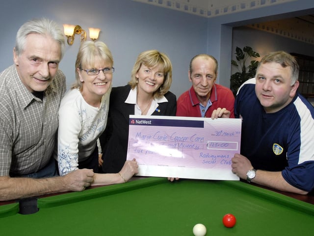 Scarborough Railway Club members raise £125 by a pool match in memory of former member, for Marie Curie Cancer Care, collected by fundraiser Cheryl Barrett (centre) - from left, Tony Martin, Andrea Martin, Bob Shotton and Paul Skelton. 071395b