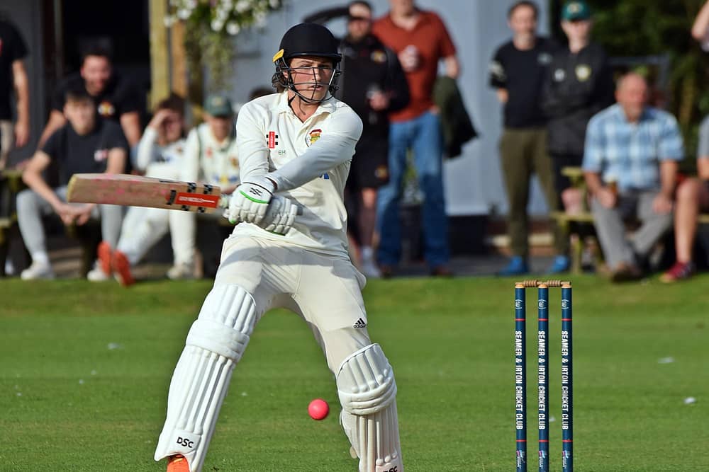 Elliot Hatton shone with bat and ball in Flixton's win
