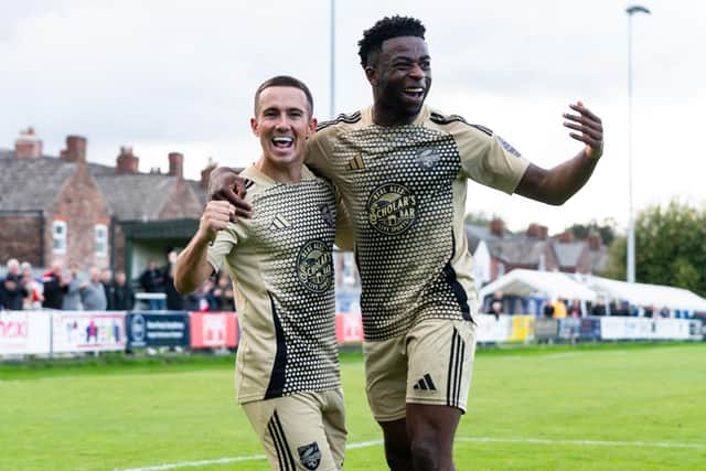 Kieran Weledji celebrates one of his goals during the cup win at Warrington Rylands. PHOTOS BY WANDERING PHOTOGRAPHY