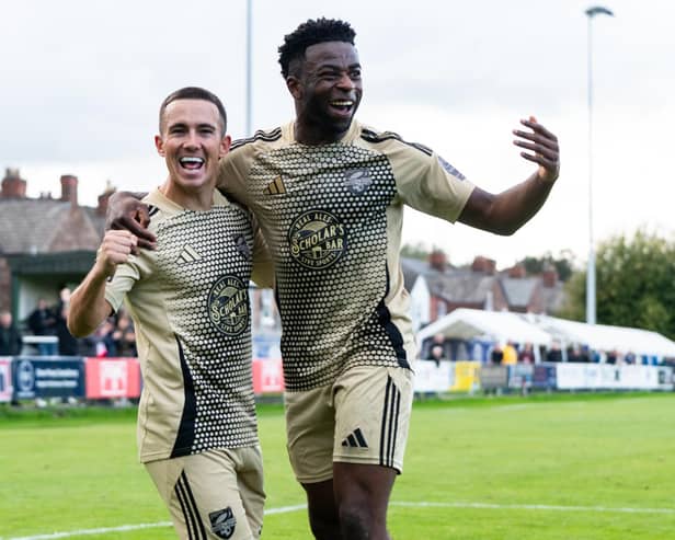 Kieran Weledji celebrates one of his goals during the cup win at Warrington Rylands. PHOTOS BY WANDERING PHOTOGRAPHY