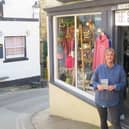 Stamping agent Hollie Gray at The Old Drapery in Robin Hood's Bay.