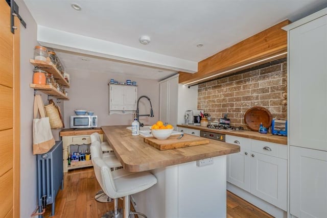 An alternative view of the beamed kitchen.