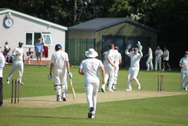 Londesborough Park celebrating a wicket on the way to victory over Pocklington