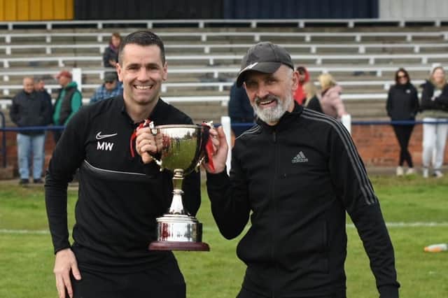 Joint Managers Mark Watkinson and Joe Cooney with the trophy PHOTO BY JIM HANSEN