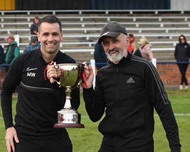Joint Managers Mark Watkinson and Joe Cooney with the trophy PHOTO BY JIM HANSEN