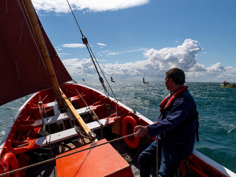 Stewart McKie controls the sail of Imperialist.