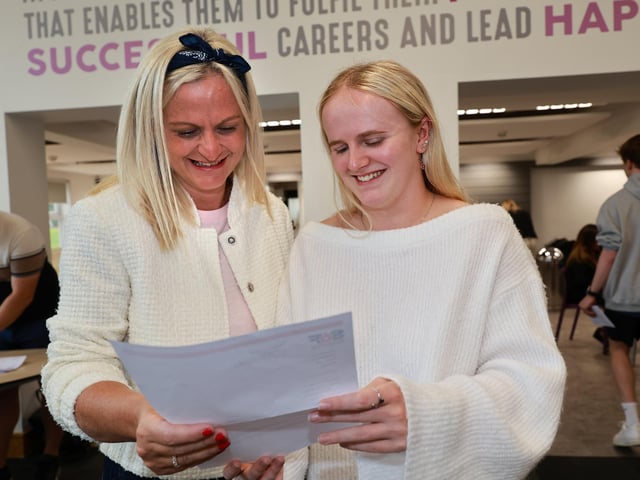 Mum and Daughter checking results.