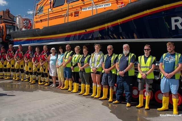 Volunteer crew of Bridlington Lifeboat with Judith and Diana Redhead. Photo: RNLI/Mike Milner