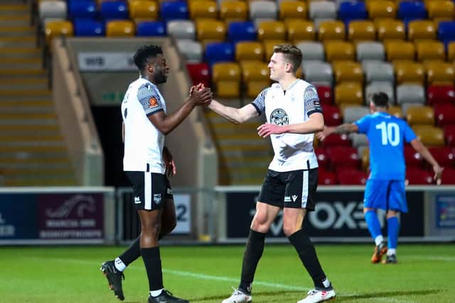 Kieran Weledji, left, is congratulated after scoring Boro's fourth goal by teammate Jake Charles, who scored the second goal.