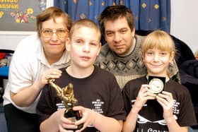 Ethan Dickinson and sister Sarah win medals in a jiu jitsu competition (PA0352-2)