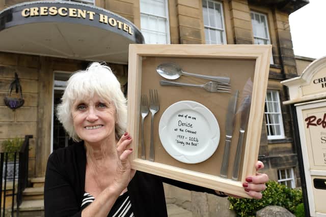Denise Horbury with one of the gifts she was given when she retired from the Crescent Hotel