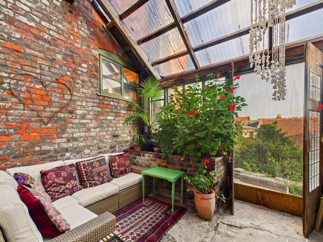 The garden room opens to outdoors.