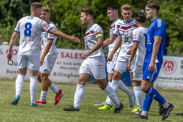 Town players celebrate the opener. Photo by Brian Murfield