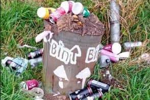 One of the bins on Bempton's Short Lane has been filled with concrete, soil and rubble by fly-tippers.