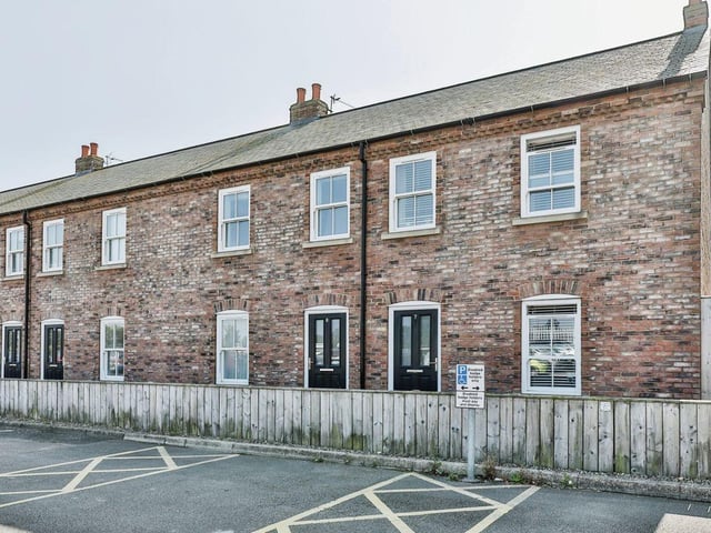 This four bedroom end terrace house is for sale with Reeds Rains for £215,000.