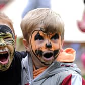 Face paint super heroes Arthur and Rory at Autumn Daze in 2021