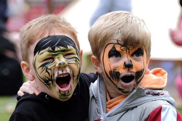 Face paint super heroes Arthur and Rory at Autumn Daze in 2021