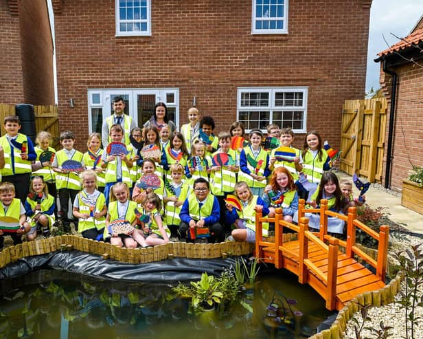 The Year Three class with their wilflife garden.