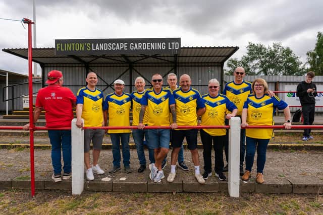 Boro fans show off the new away kit, which was only launched the previous night, at Selby Town. Photo by Wandering Photography