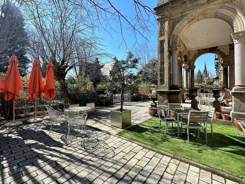 A stunning, south-facing courtyard garden lies to the front of the property.