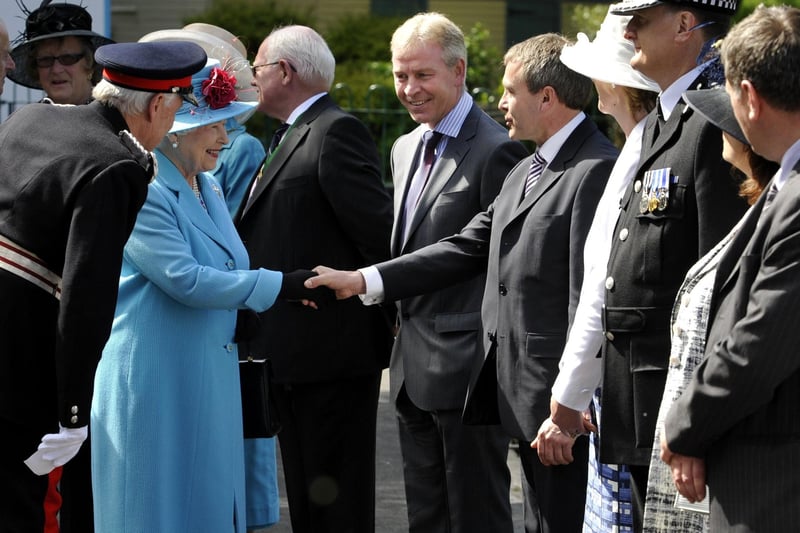 The Queen shakes hands with Robert Goodwill, newly returned Conservative MP for Scarborough and Whitby. Next to him (L) is Richard Flinton, newly appointed head of North Yorkshire County Council.
102036w