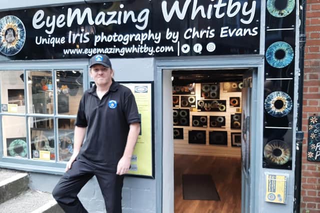 Chris Evans outside his photography business on Flowergate, Whitby.