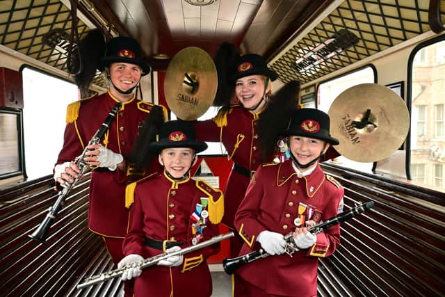 Members of Smågardistene - Stabekk Skoles Musikkorps at The Central Tramway Cliff funicular railway