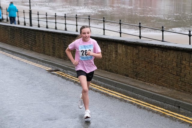 Smiling despite the rain.