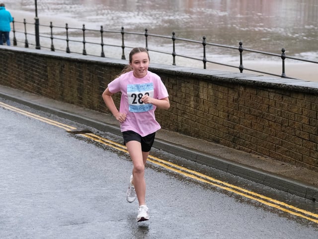Smiling despite the rain.