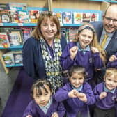 Headteacher Tim Jolly and acting deputy headteacher Michaela Chalk with children at Braeburn Primary and Nursery Academy, celebrating positive comments from school inspectors Ofsted.