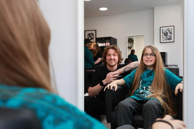 Aaron prepares for his special charity haircut with hairdresser Ethan Pashby