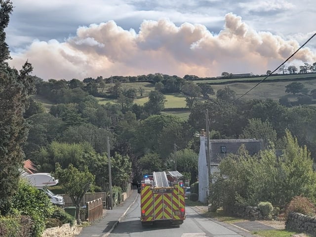 The billowing smoke has caused a number of road closures.