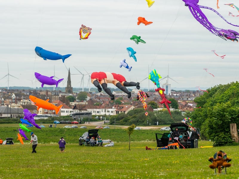 Scores of exotic inflatables adding a splash of colour to the cliff tops above the seaside resort.