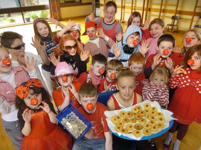 Red Nose Day... Youngsters at Hunmanby Primary School raise cash by buying red nose biscuits.091168a