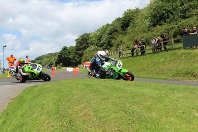 Adrian Harrison and Rob Hodson in action at Oliver's Mount. PHOTO BY DEAN STEDMAN