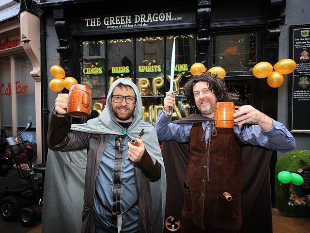 A celebratory pint outside the pub.