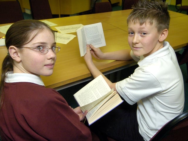 Norton College World Book Day activities in 2007 - students Olivia Hammond (left), and Alan Slasor enjoy a good read.