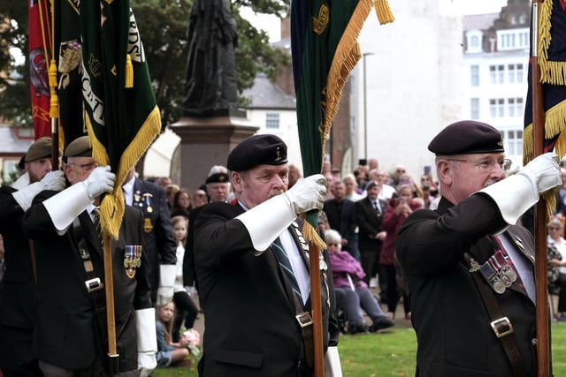 Standard bearers arrive at the Town Hall gardens